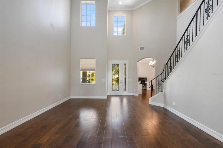 Generously sized living room/family room you decide with two story ceilings the space is breathtaking.