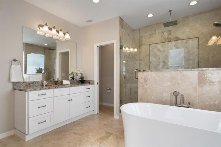 Fully renovated in 2021. Drawer stacks for easy storage, two vanities, oversized shower and separate water closet all await you!