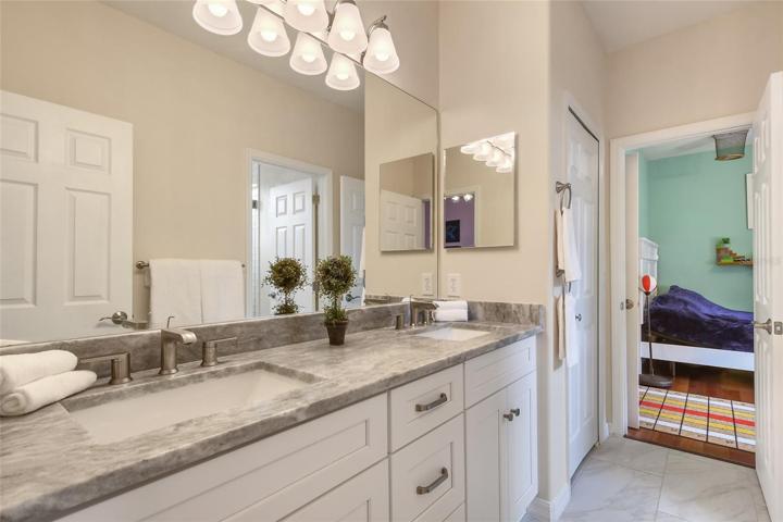 Inside the Jack n' Jill bathroom renovated in 2021 dual sinks, updated 8