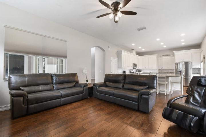 Window Treatments, Ceiling Fan, Can lighting.....new everything make this a welcome space to hose a large family with adjoining kitchen so everyone can hang out while dinner is being prepared.