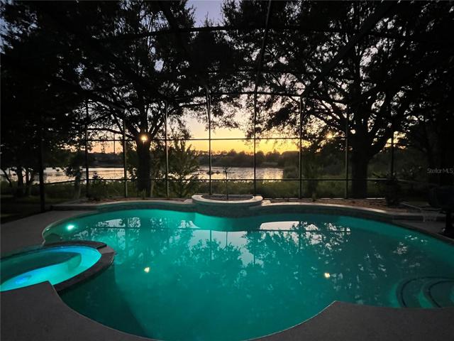 Tranquility abounds here at 4430 INDIAN DEER ROAD in Windermere
