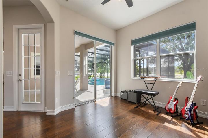 Entering from the living room the Flex room is spacious, has immediate access to the pool area through sliders or door and can become another bedroom by adding a double door entry or use it as is for your own special purpose.  or an office