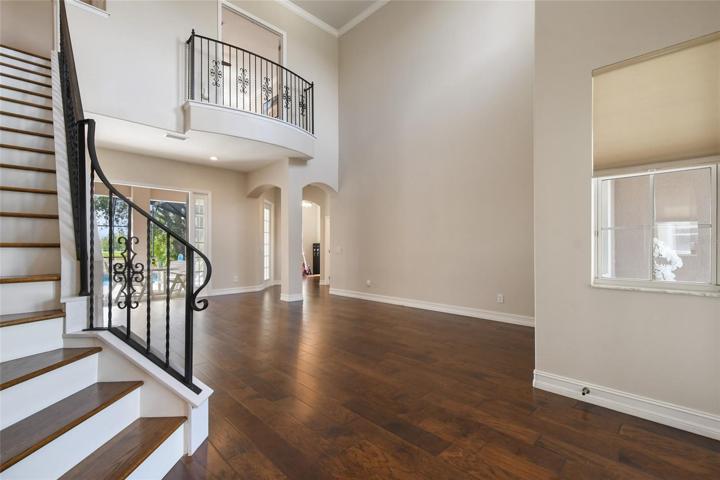 A grand entrance awaits you with high ceilings and an open floor plan.