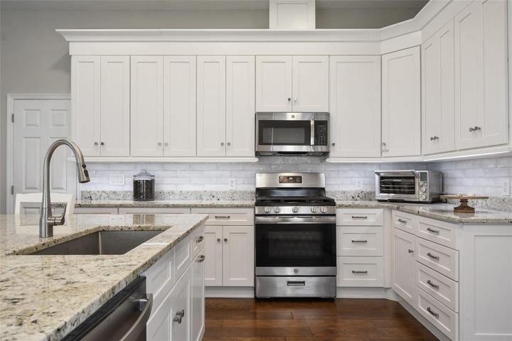Tremendous storage, drawer stacks, vented microwave to keep the odors out are additional features of this 2021 kitchen remodel.