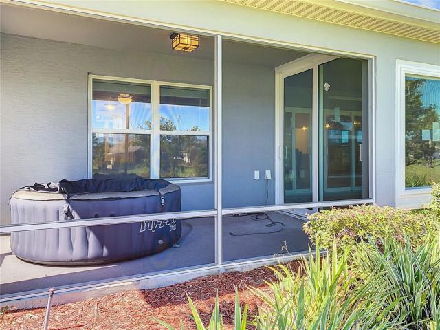 1 of 2 screened in back Porches facing Pond with Portable Jacuzzi!