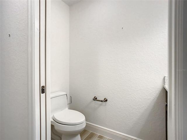 Half Bath just off the Kitchen/Garage.