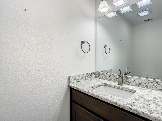 Half Bath just off the Kitchen/Garage.