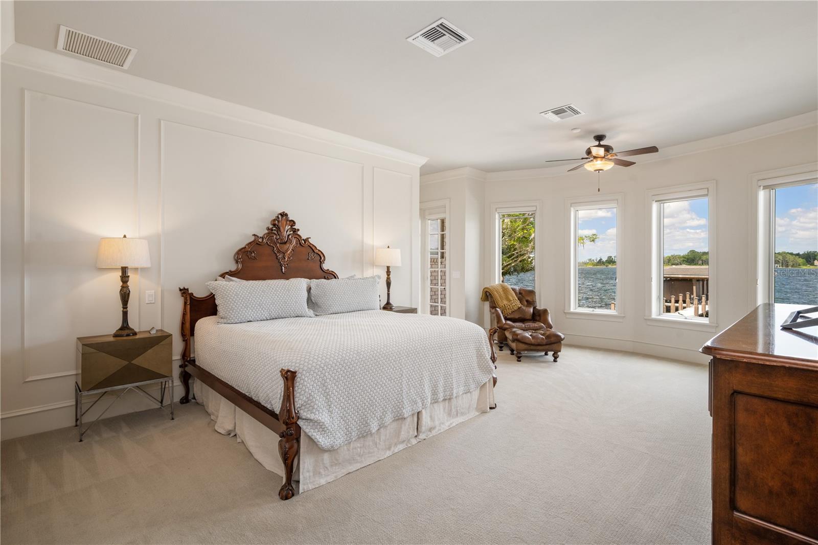 First floor owner's retreat, featuring double closets, ensuite bath and large bay window, with incredible water views.