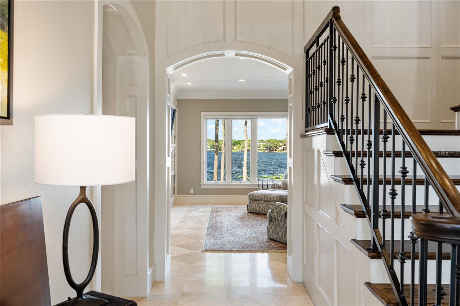 The formal staircase, off both the entry and the kitchen, was designed to allow for unobstructed water views from almost every place in the house!