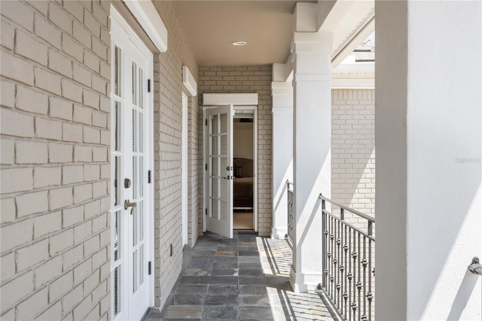 Front balcony inspired by Charleston and New Orleans.