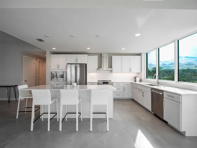 Open kitchen with large picture windows
