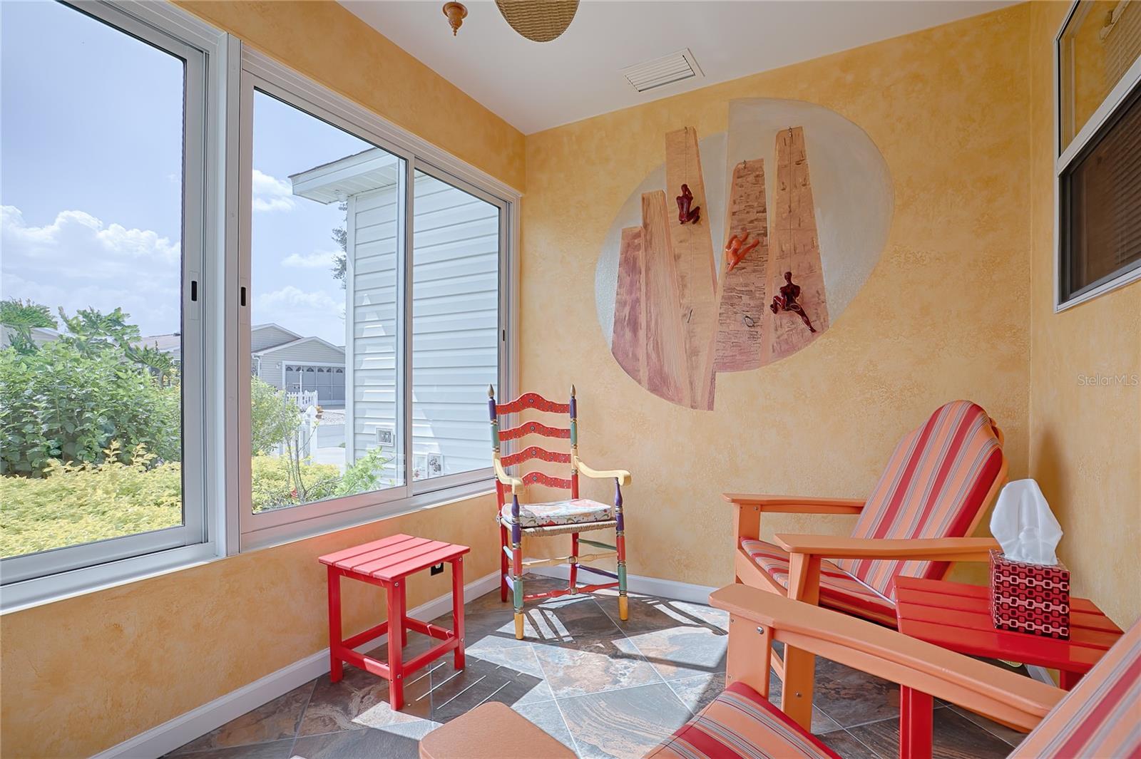 THIS SITTING AREA IS PERFECT FOR ENJOYING MORNING COFFEE OR HAVING A CHAT WITH NEIGHBORS