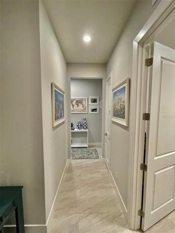 Hallway from garage, laundry room on right.
