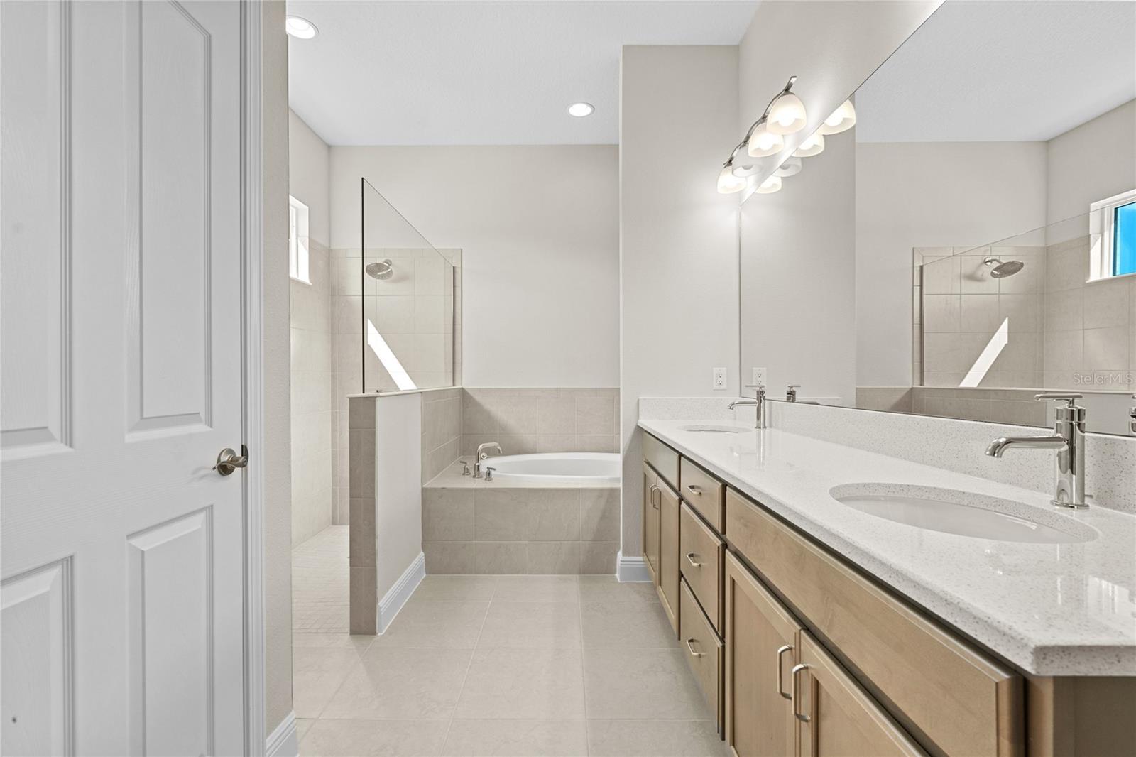 5 piece primary bath with linen closet
