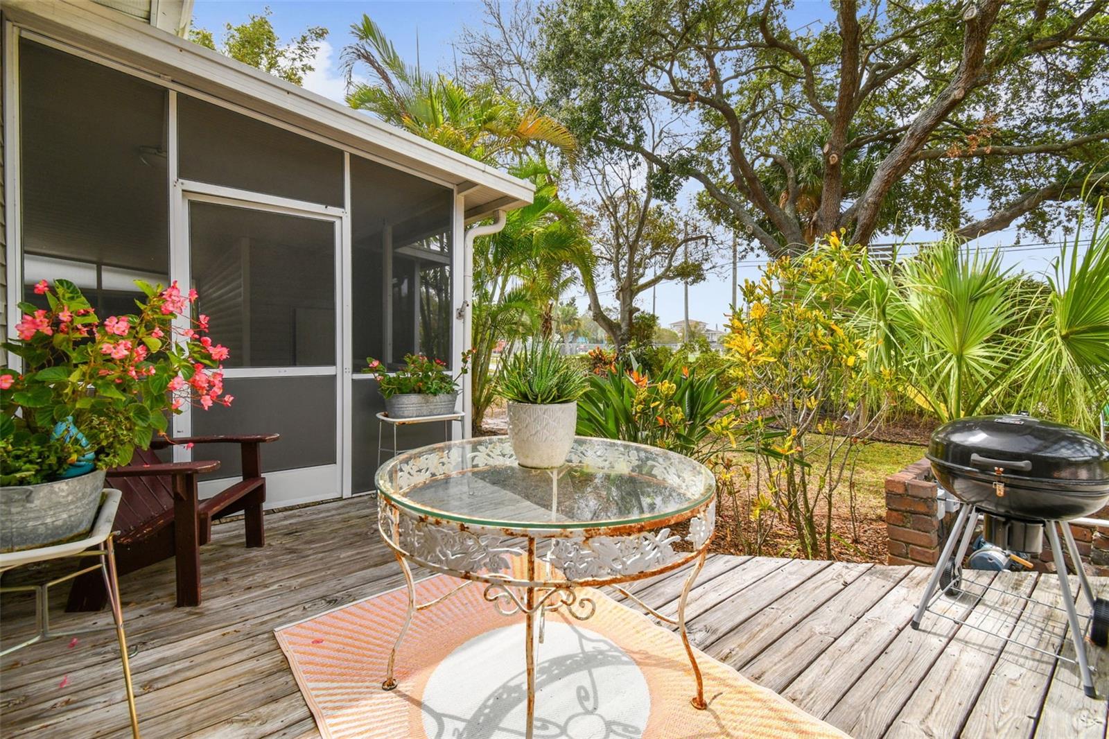 The open deck leads to an over-sized screen room.