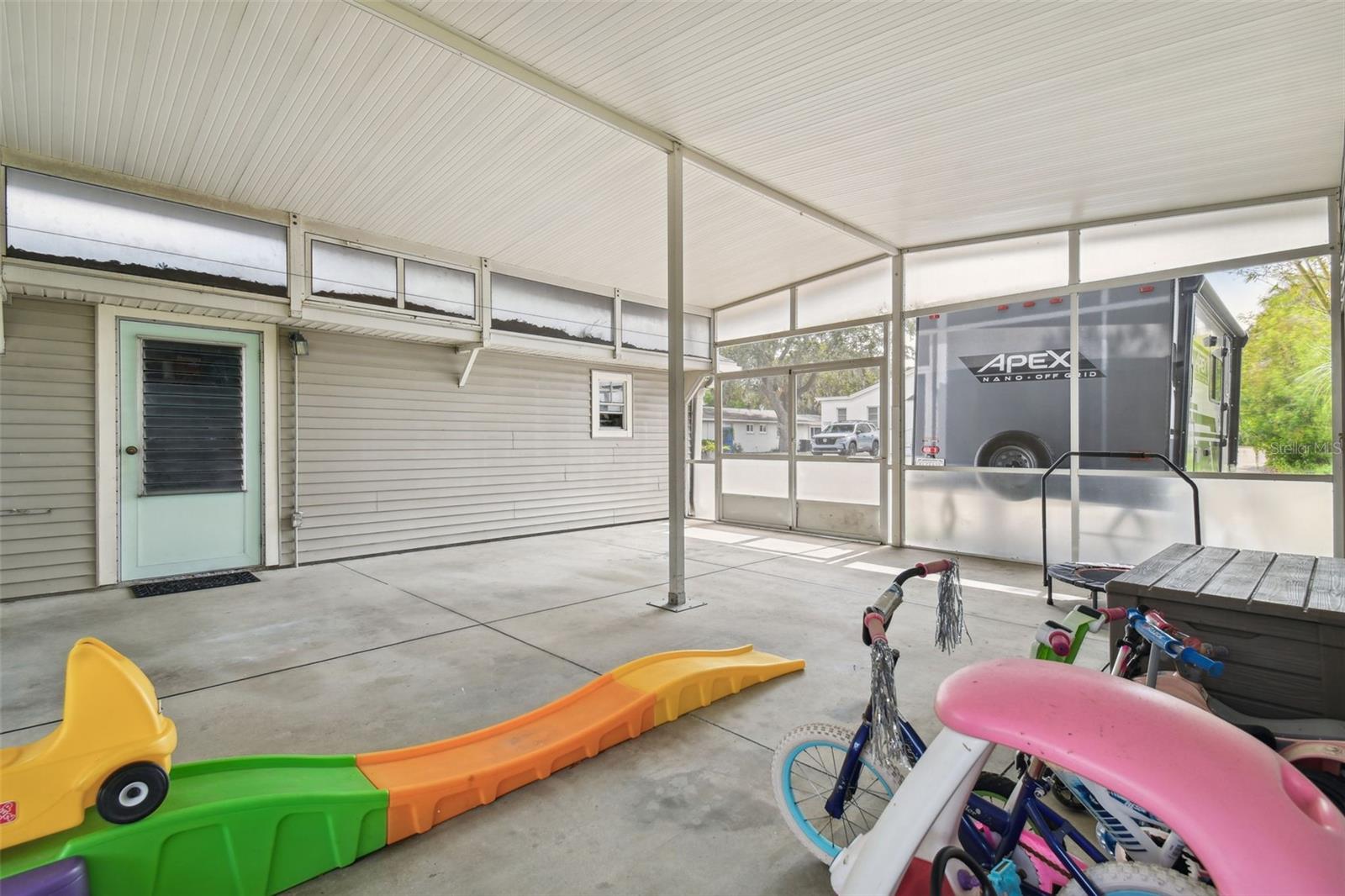 More play area or covered parking. Back door parking as well.
