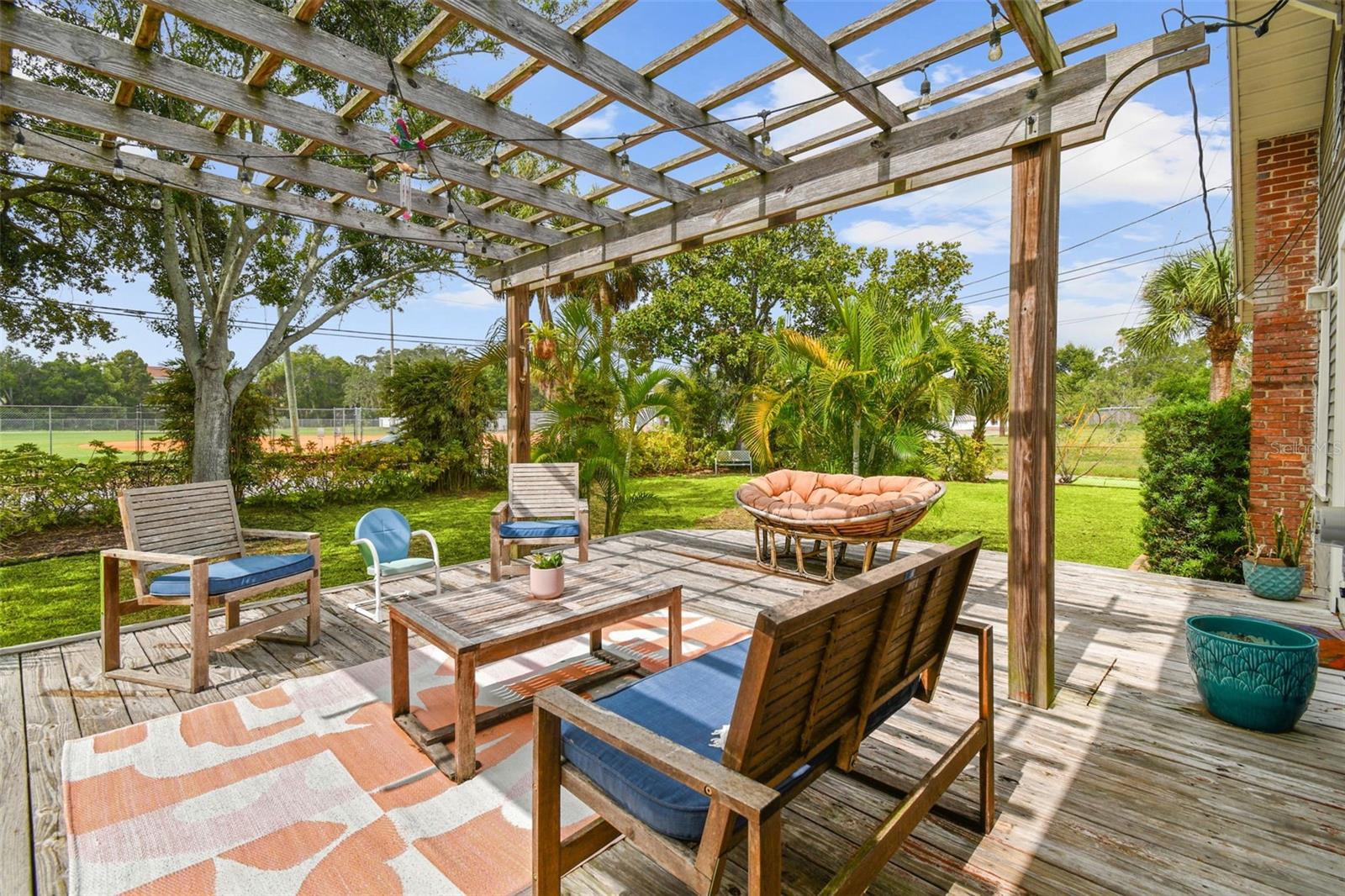 Outside your living room/kitchen combo. Large deck for entertaining.