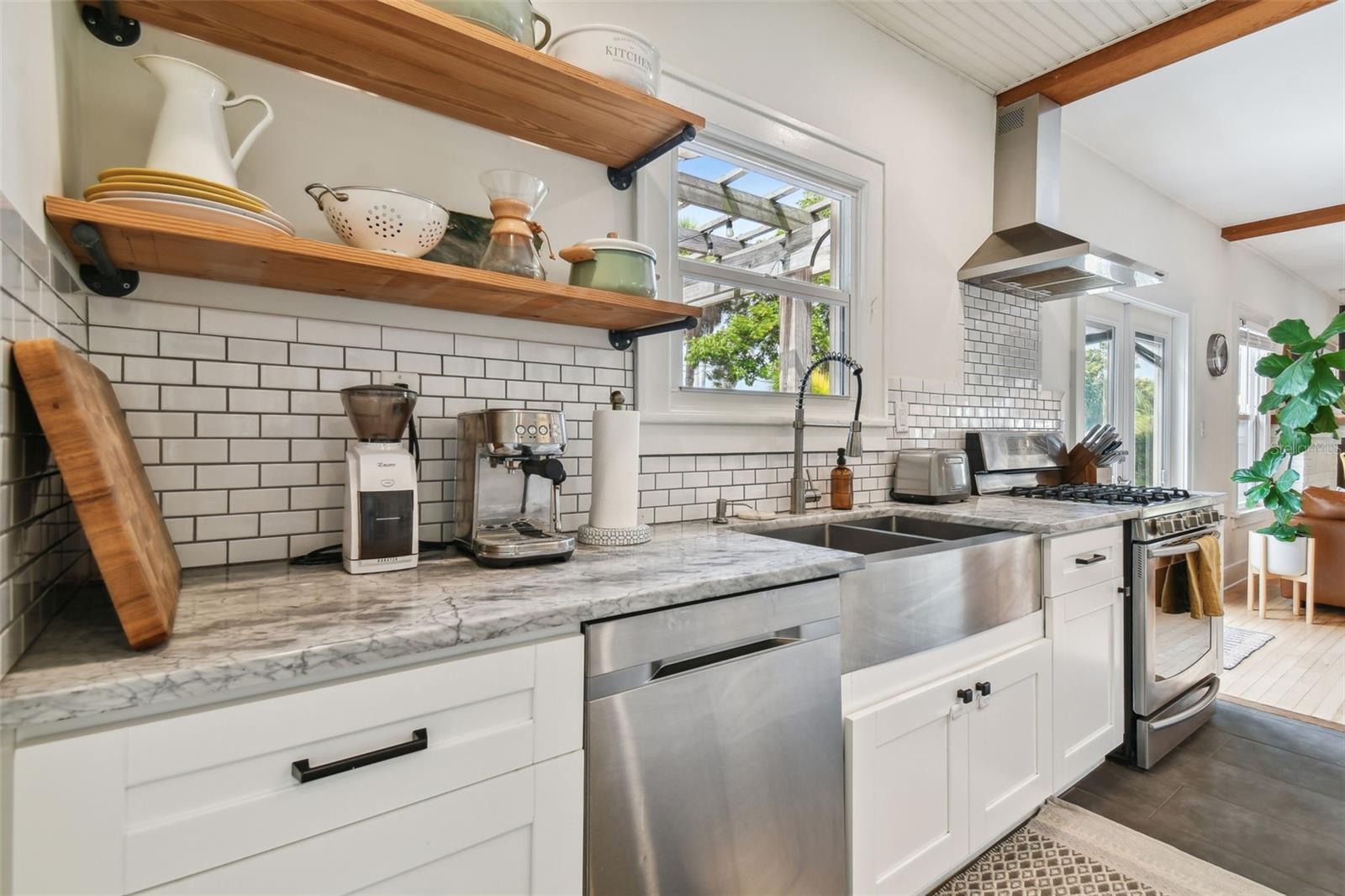 Stainless two-tun farm sink plus dishwasher. All the charm of the old with the convenience of the new!