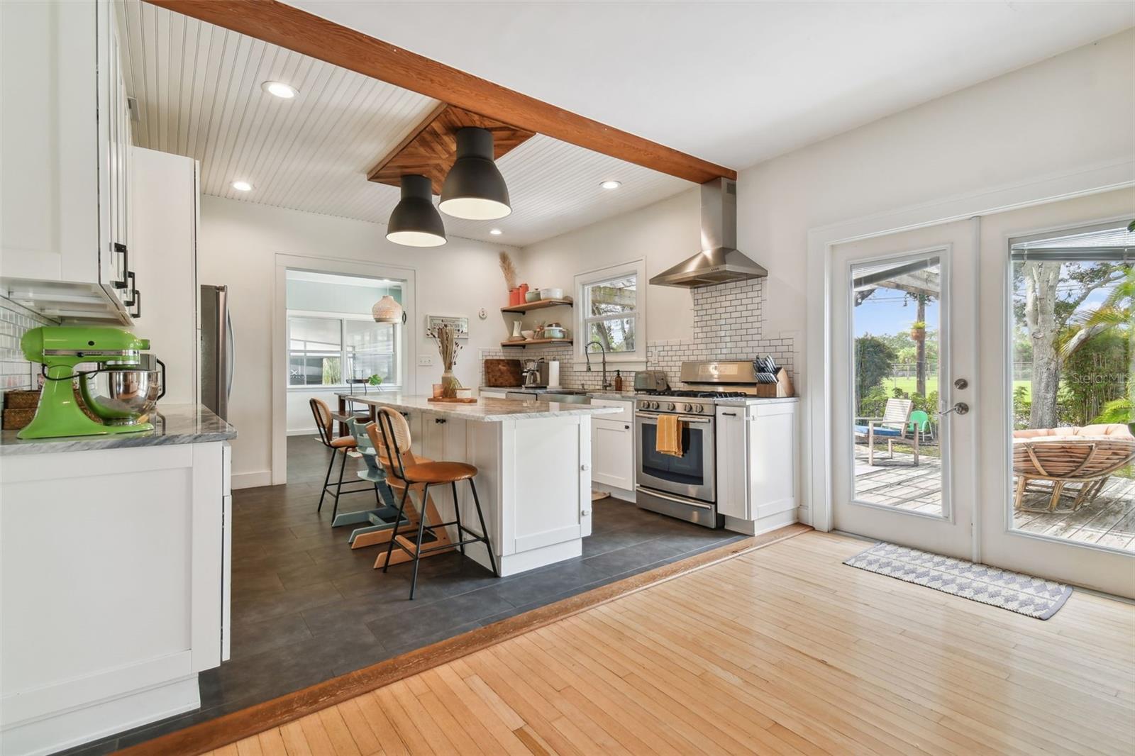 Beautiful remodeled open kitchen. French doors lead to your outside deck.