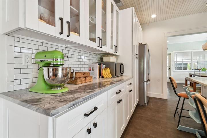 A close up of your marble counters and designer cabinets.