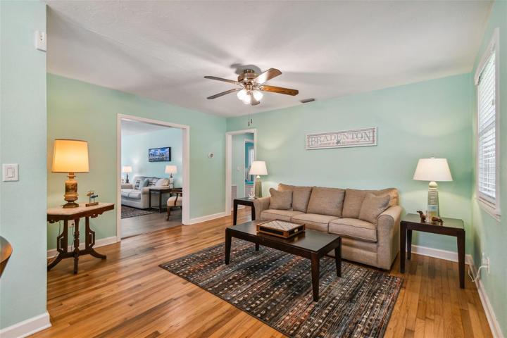 Formal living opens to dining and large family room