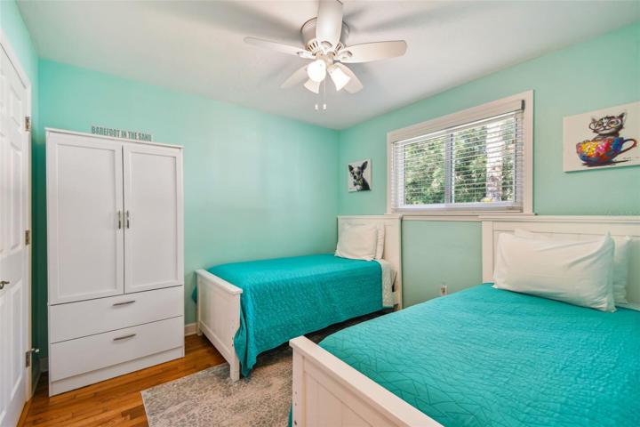 Guest bedroom with laundry room