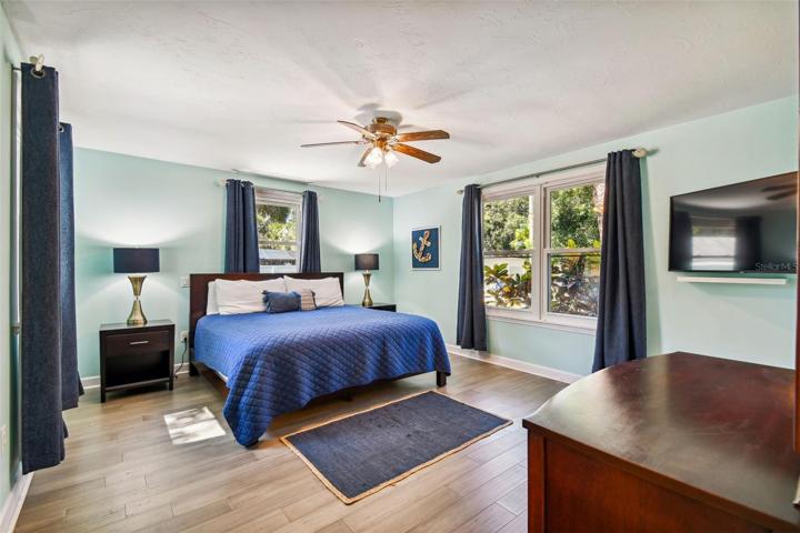 Primary suite with large bath and huge walk-in closet.  Lifeproof bamboo flooring make maintenance a breeze.