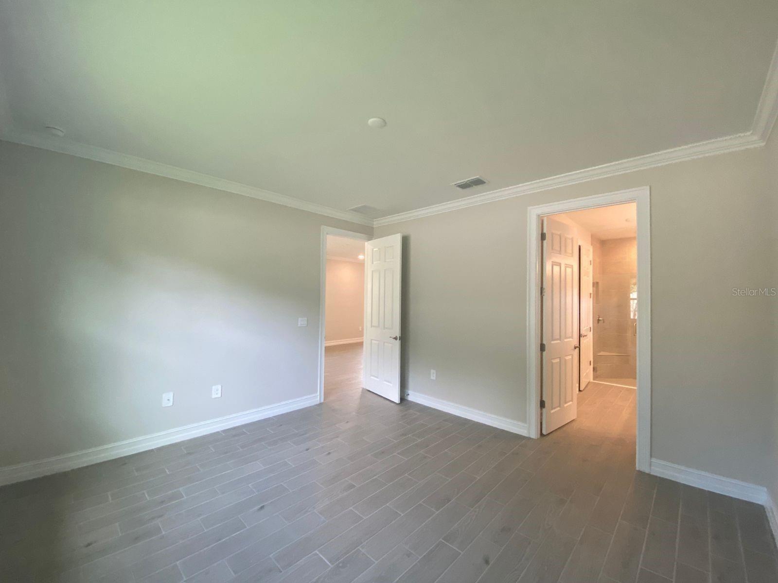 Master Bedroom with door to private Bath