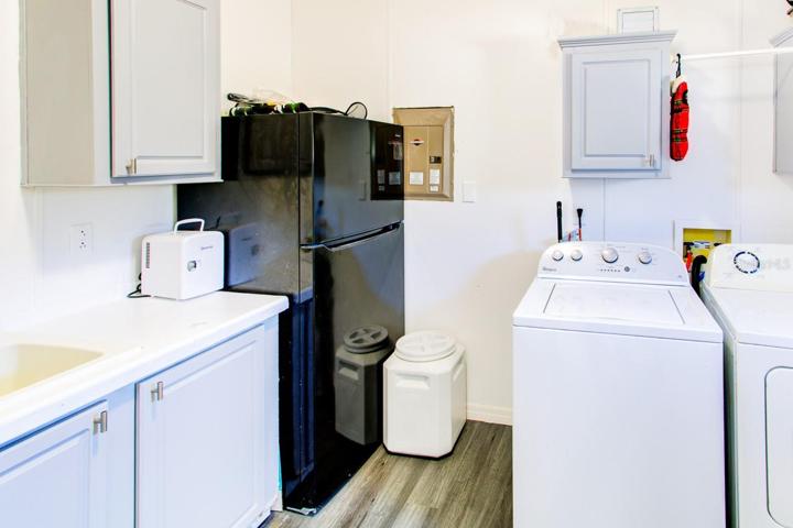 Inside laundry room.