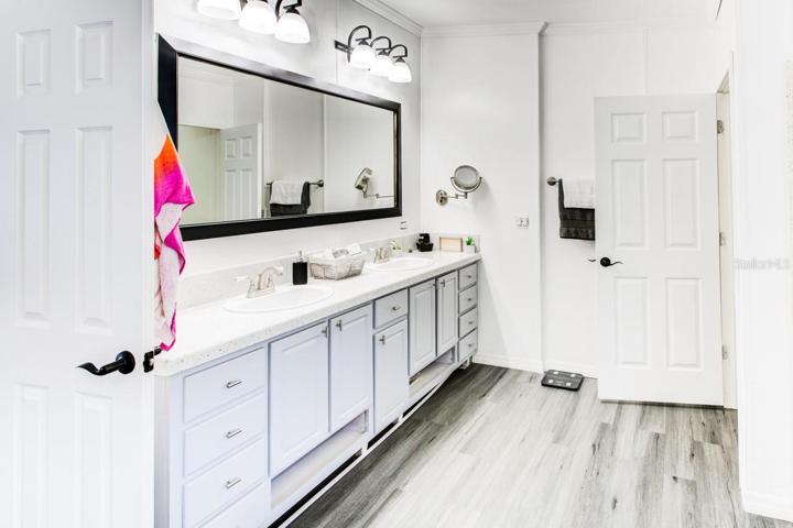 Master bath with epoxy counter top.