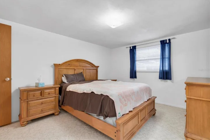 primary bedroom with walk in closet