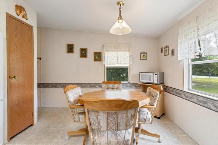 Kitchen eat-in area overlooking front yard and driveway