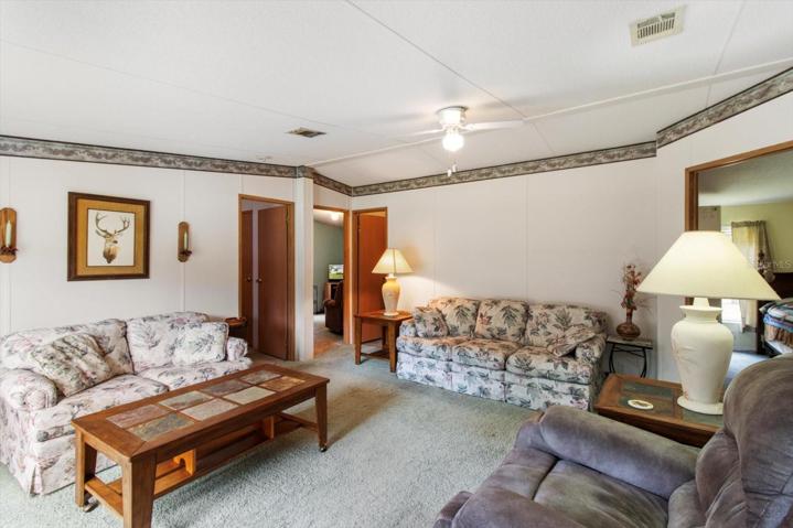 Living room greets you from the front door 16 x 13