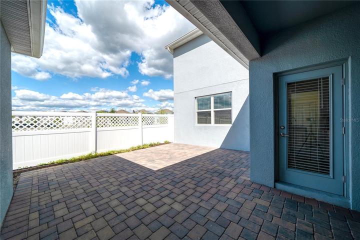 Covered breezeway between the main house and garage
