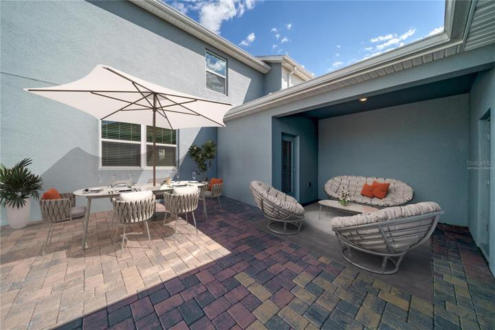Virtually staged - Private, fenced and pavered back patio