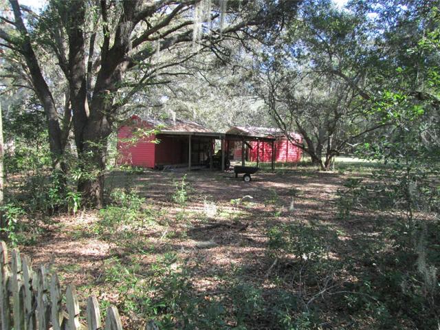 From back of pasture looking towards barn and feed and tack room