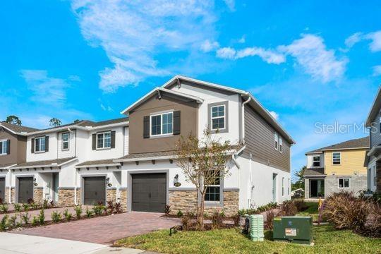 Brand new construction * four bedrooms and three bath townhome built by M/I Homes in the heart of Oviedo, Florida