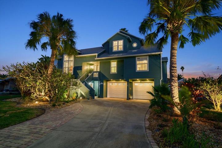 Lovely!! Three level residence with three bedrooms and additional bonus area on ground level.
