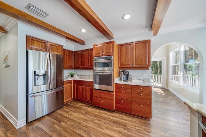 Spacious and fully equipped newly remodeled kitchen. Convection oven and microwave. Gorgeous!
