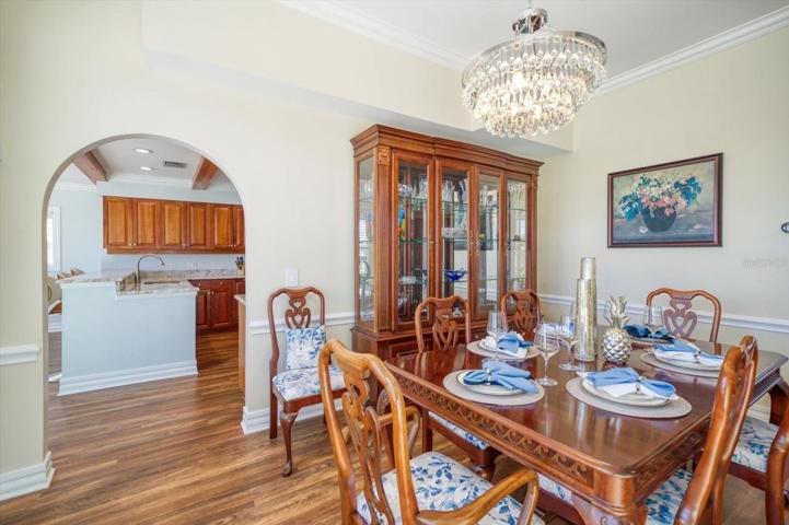 Arched entries enhance numerous areas of this fine home so rich in details.