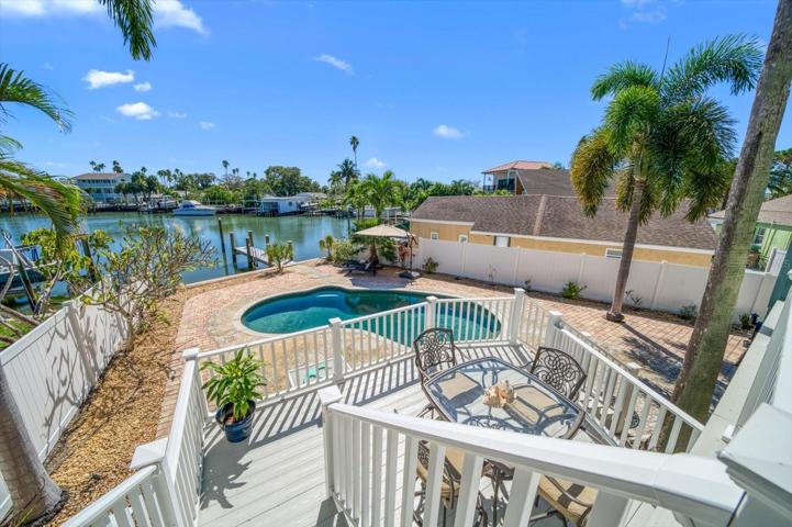 Fenced rear yard surrounds salt water pool. Multi level decking allows for plenty of room to spread out!