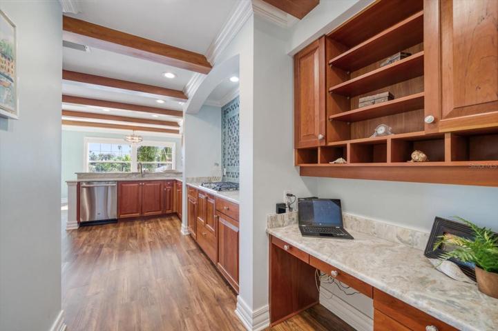 Fall in love with this outstanding kitchen with lots of storage, and additional work space. You  can enjoy every moment of  working at home.