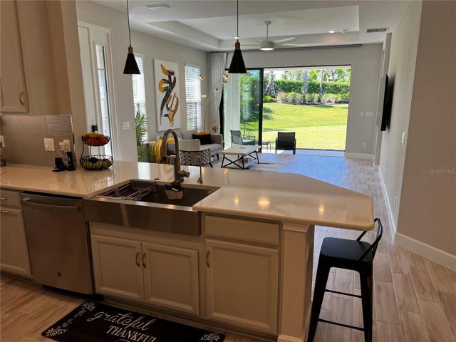 Kitchen with view to the Living Room and Lanai