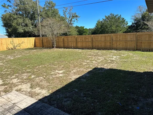Large, fenced backyard