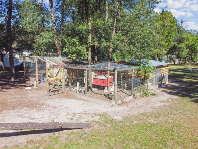 4 chicken coups on property.