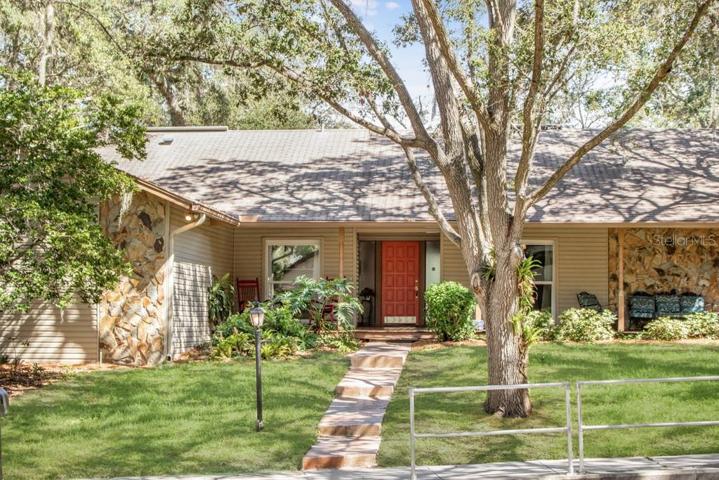 . As you approach the front of the house, you'll be greeted by a large front porch that exudes Southern charm and provides the perfect spot to sit on your cozy outdoor furniture creating a welcoming and inviting space where you can enjoy your morning coffee or evening sunsets.