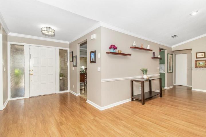 View from living room to front door and foyer
