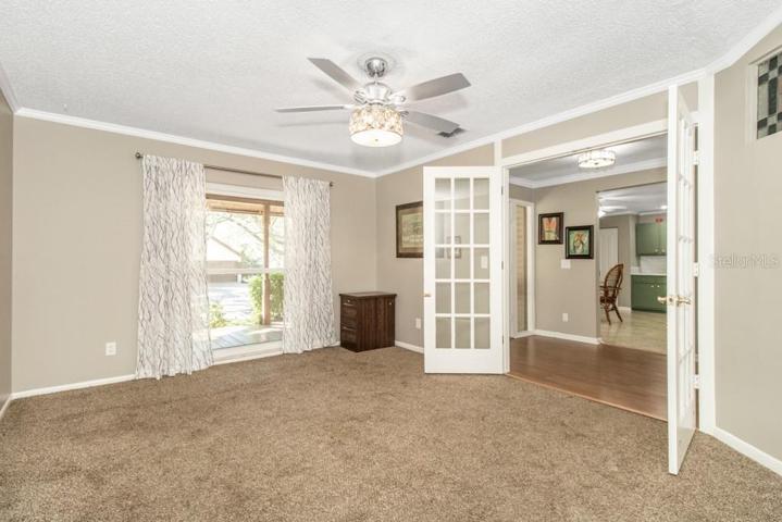 Formal dining area to the right of the foyer that is versatile and could be used as a den/office/guest room if desired.