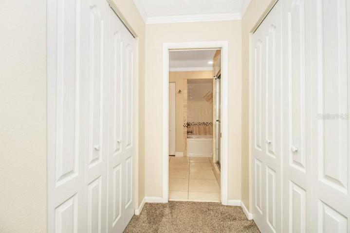 Master Suite featuring dual closets and en-suite bathroom