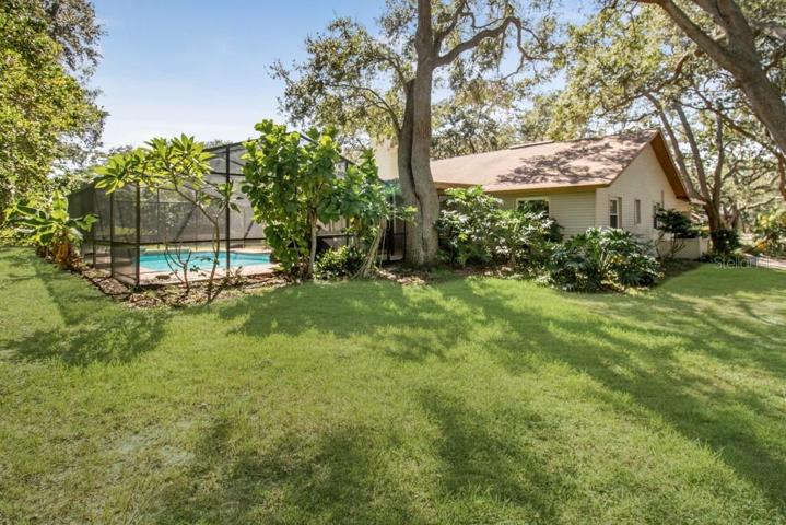 Nestled on a generous corner lot adorned with lush, mature landscaping, this home is ready to become your personal haven.